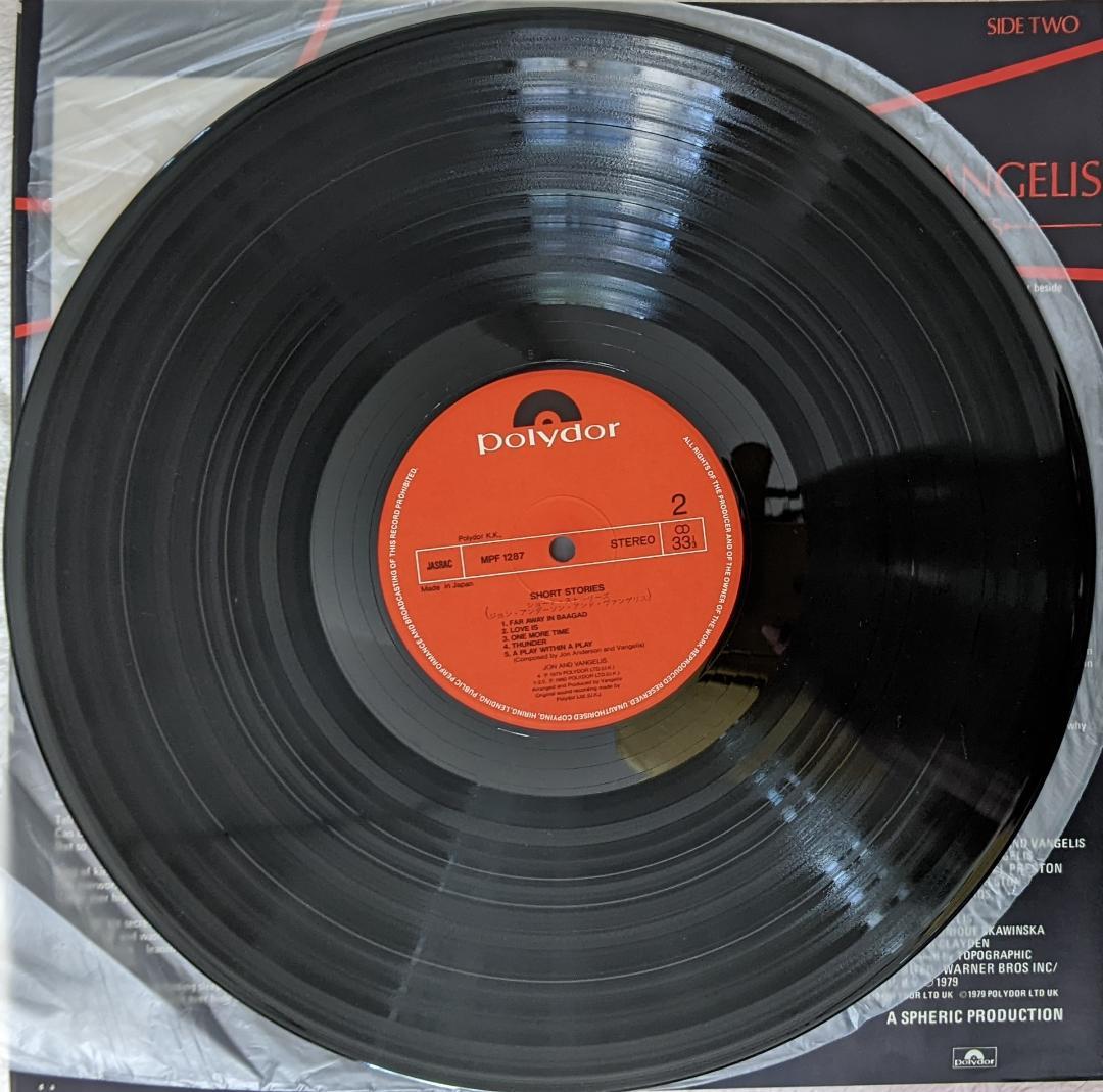 Vangelis Jon & Short Stories LP Japanese Domestic Import, Slight Wear | Japansoundstore