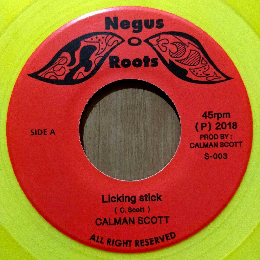 Calman Scott - Licking Stick 7" Single Yellow Vinyl Negus Roots Reggae Rare