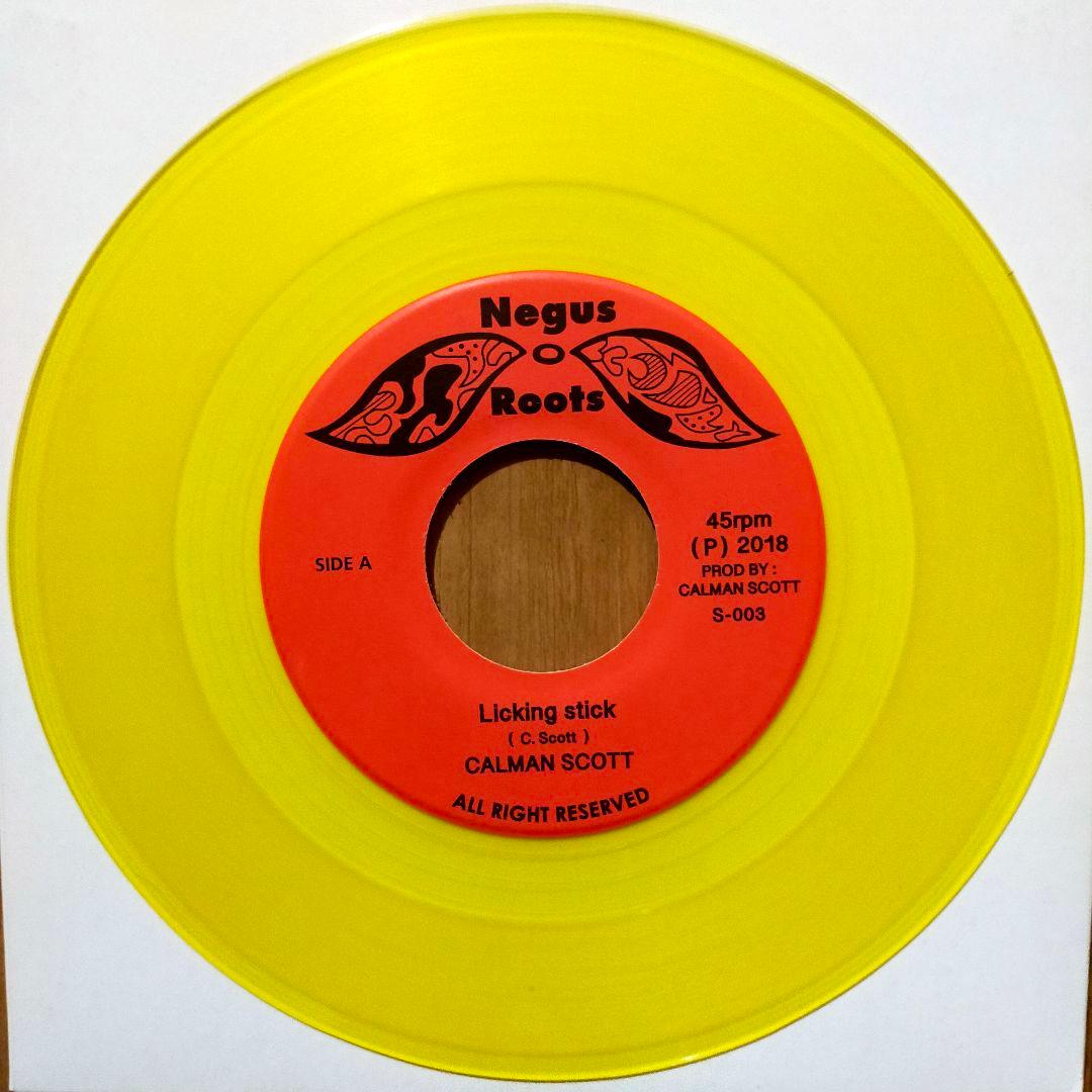 Calman Scott - Licking Stick 7" Single Yellow Vinyl Negus Roots Reggae Rare