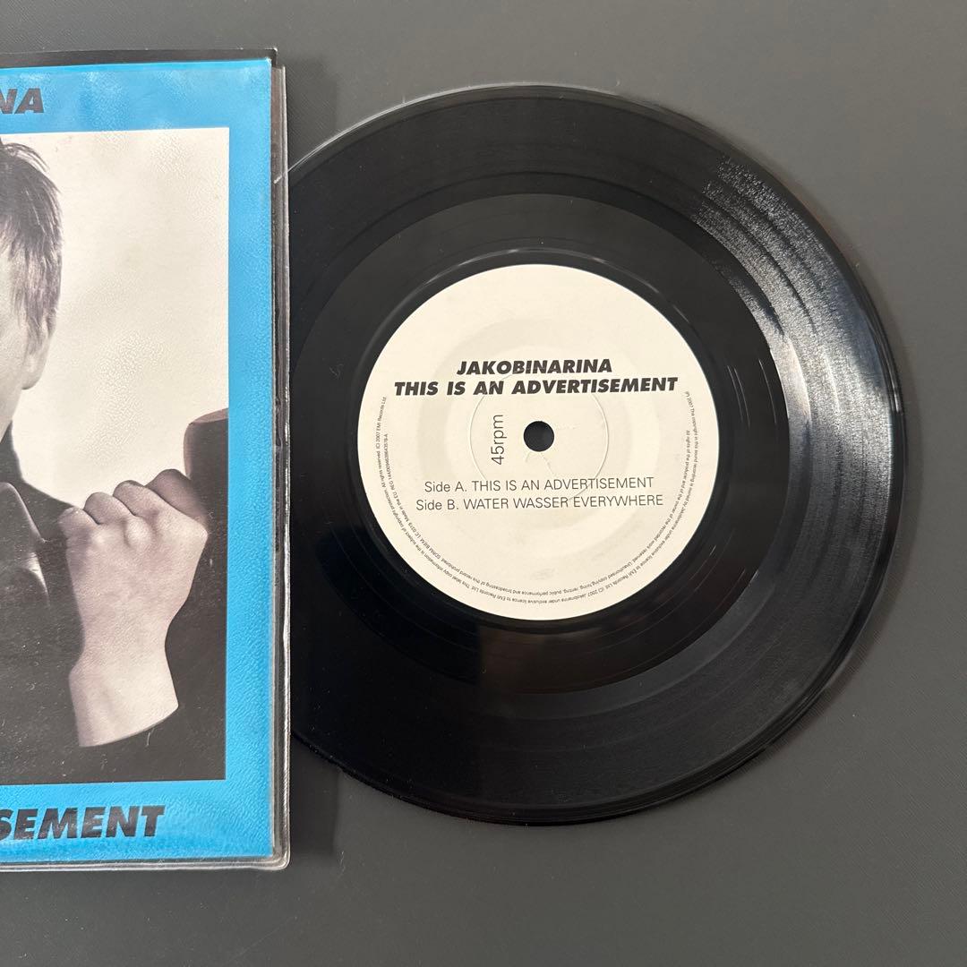 Jakobinarina - This Is An Advertisement 7" Vinyl Single w/ Poster
